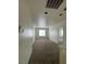 Upstairs hallway with plush carpet, natural light, and access to multiple rooms at 731 Emerald Idol Pl, Henderson, NV 89011