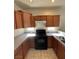Functional kitchen with tile floors, plenty of cabinets, and modern appliances at 731 Emerald Idol Pl, Henderson, NV 89011