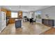 Spacious kitchen and dining area featuring stainless steel appliances and tile floors at 765 Crimson Peak Pl, Henderson, NV 89011