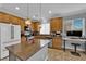 Well-equipped kitchen featuring an island, stainless steel appliances, and a dedicated workspace at 765 Crimson Peak Pl, Henderson, NV 89011
