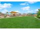Spacious community park with playground, picnic areas, and lush green lawn for recreation at 765 Crimson Peak Pl, Henderson, NV 89011