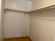 A basic empty closet with a simple shelf and rod at 7732 Blackbird Ave, Las Vegas, NV 89145