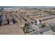 Aerial view of a home featuring desert landscaping and a private backyard with a pool at 7797 Hauck St, Las Vegas, NV 89139