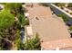 Aerial view of a tile roof home with backyard pool and patio at 812 Eaglewood Dr, Las Vegas, NV 89144