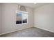 Cozy bedroom with a view of the private backyard, offering a peaceful retreat at 9871 Magnus Ct, Las Vegas, NV 89178