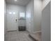 The entryway offers ample natural lighting and tile flooring at 9871 Magnus Ct, Las Vegas, NV 89178
