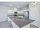 Spacious kitchen with an island, stainless steel appliances, and white cabinetry at 9871 Magnus Ct, Las Vegas, NV 89178