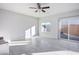 Spacious living area filled with natural light from large windows, and sliding door access to the backyard at 9871 Magnus Ct, Las Vegas, NV 89178