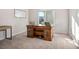 Home office featuring a large desk and neutral carpeting at 9871 Magnus Ct, Las Vegas, NV 89178