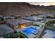 Stunning aerial view showcases the property's backyard oasis and its location in a desirable neighborhood at 10048 Copper Edge Rd, Las Vegas, NV 89148