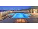 Backyard pool with hot tub, fire pit, and city views from this home at 10048 Copper Edge Rd, Las Vegas, NV 89148