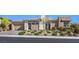 Charming single-story home with a stone exterior, well-maintained landscaping, and an attached two-car garage at 10048 Copper Edge Rd, Las Vegas, NV 89148