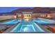 Stunning backyard pool and spa with mountain views and seamless transition to indoor/outdoor living at 10048 Copper Edge Rd, Las Vegas, NV 89148