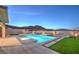 Backyard pool with built-in hot tub, fire pit, and mountain views at 10048 Copper Edge Rd, Las Vegas, NV 89148