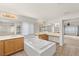 Bathroom with soaking tub, dual sinks, and natural light at 10501 Haywood Dr, Las Vegas, NV 89135