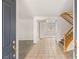 Inviting foyer with tile flooring, staircase and ample natural light at 10501 Haywood Dr, Las Vegas, NV 89135