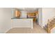 Kitchen with stainless steel appliances, wood cabinets, and tiled flooring at 10501 Haywood Dr, Las Vegas, NV 89135