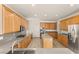 Spacious kitchen with a center island, stainless appliances and ample cabinetry at 10501 Haywood Dr, Las Vegas, NV 89135
