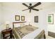 Cozy bedroom with natural light, ceiling fan and views to other rooms at 10633 Tinta Ln, Las Vegas, NV 89144