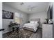 Cozy bedroom with a queen-sized bed, stylish rug, and modern decor for a comfortable retreat at 10725 Bernini Dr, Las Vegas, NV 89141