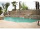 Beautiful backyard pool with stone accents and fountains, creating a relaxing retreat at 10725 Bernini Dr, Las Vegas, NV 89141