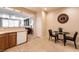 Breakfast nook attached to kitchen with great natural light and tile flooring at 11253 Piper Peak Ln, Las Vegas, NV 89138