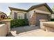 Beautiful home with a two-car garage and manicured landscaping at 11253 Piper Peak Ln, Las Vegas, NV 89138
