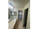 Bright bathroom with long vanity and lots of counter space at 1209 Equator Ave, North Las Vegas, NV 89032