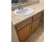 Bathroom sink featuring a cream countertop and light brown cabinets below at 1209 Equator Ave, North Las Vegas, NV 89032