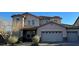 Charming two-story home featuring a three-car garage and well-maintained landscaping at 1209 Equator Ave, North Las Vegas, NV 89032