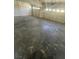 Empty two car garage interior at 1209 Equator Ave, North Las Vegas, NV 89032