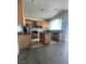 Kitchen with island, granite countertops, and stainless steel appliances at 1209 Equator Ave, North Las Vegas, NV 89032