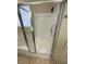 Walk-in shower with glass doors and white tile at 1209 Equator Ave, North Las Vegas, NV 89032