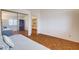 Well-lit bedroom with mirrored closet and an ensuite bathroom at 1319 Highland Ct, Boulder City, NV 89005