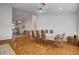 Dining area adjacent to the kitchen with wood floors and space for a large table at 1319 Highland Ct, Boulder City, NV 89005