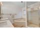 Relaxing main bathroom with a corner tub, tiled shower, and double vanity at 1319 Highland Ct, Boulder City, NV 89005