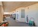 Spacious, enclosed patio area with unique wall texture and ample space for storage or hobbies at 1319 Highland Ct, Boulder City, NV 89005