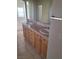 Bathroom features a double sink vanity with plenty of storage space underneath at 1540 Sabatini Dr, Henderson, NV 89052