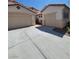 Exterior view of a single-Gathering home with a wide driveway leading to two attached garages at 1540 Sabatini Dr, Henderson, NV 89052