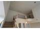 Spacious entryway with staircase leading to an upper level balcony and chandelier lighting at 1540 Sabatini Dr, Henderson, NV 89052