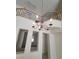 High ceiling foyer boasts decorative chandelier and open railing staircase at 1540 Sabatini Dr, Henderson, NV 89052