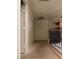 Hallway featuring carpeted floors and a storage closet on the upper level of the home at 1540 Sabatini Dr, Henderson, NV 89052