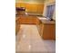 Open kitchen with granite countertops, stainless steel appliances, and ample cabinet space at 1540 Sabatini Dr, Henderson, NV 89052