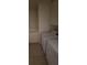 Bright laundry room with white cabinets and modern washer and dryer at 1540 Sabatini Dr, Henderson, NV 89052
