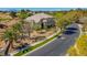 Aerial view of a property nestled in a lush community near a beautiful golf course at 165 Inveraray Ct, Henderson, NV 89074