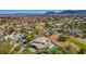 Beautiful aerial view showcasing the pool, golf course, and mountain views at 165 Inveraray Ct, Henderson, NV 89074