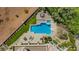 An overhead view showing the luxurious pool, dining area, and lush green spaces at 165 Inveraray Ct, Henderson, NV 89074