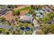 Aerial view of a stunning home with a tile roof, swimming pool, and circular driveway at 165 Inveraray Ct, Henderson, NV 89074