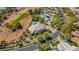 Expansive estate featuring a private pool, lush landscaping, and a prime location on a golf course at 165 Inveraray Ct, Henderson, NV 89074