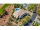 Luxury home boasts a sparkling pool, meticulous landscaping, and a desirable location adjacent to a golf course at 165 Inveraray Ct, Henderson, NV 89074